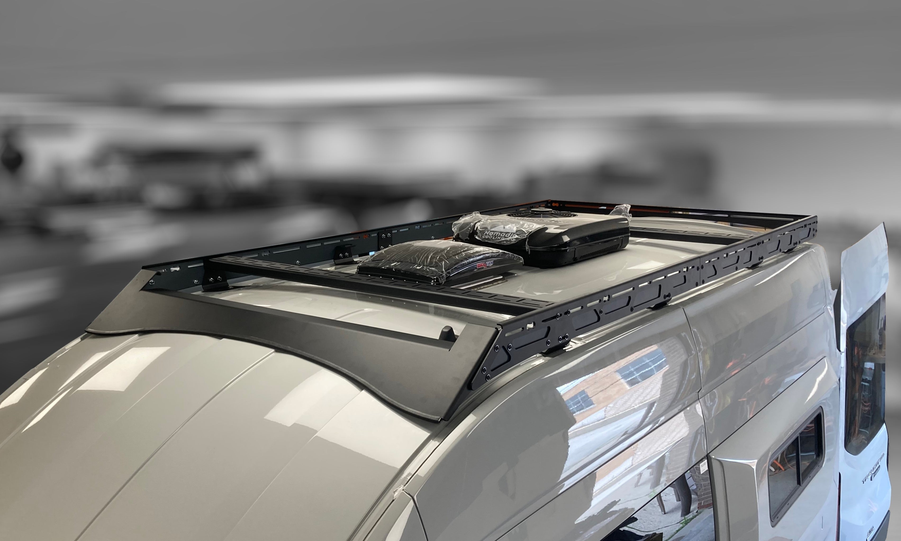 ROVER VANS SLEEK LOW-PROFILE MODULAR ALUMINUM ROOF RACK SYSTEM